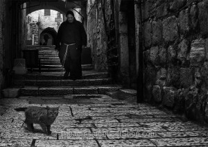 Monk and Cat in Old City Jerusalem - Photo by Ian Norton