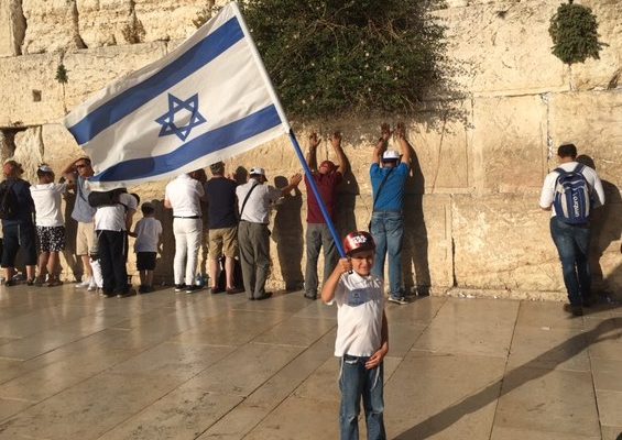 Child celebrating Israel at the Kotel - Western Wall