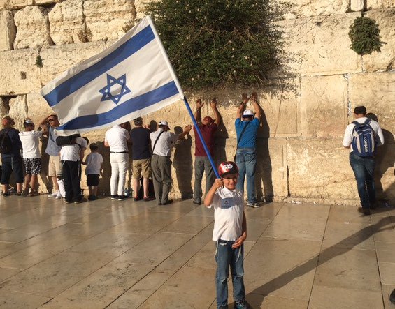Child celebrating Israel at the Kotel - Western Wall
