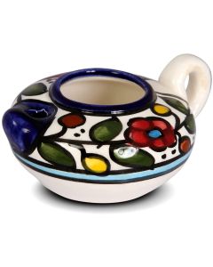 A Herodian oil lamp is a handmade Armenian ceramic that features a beautiful Color flower decoration
